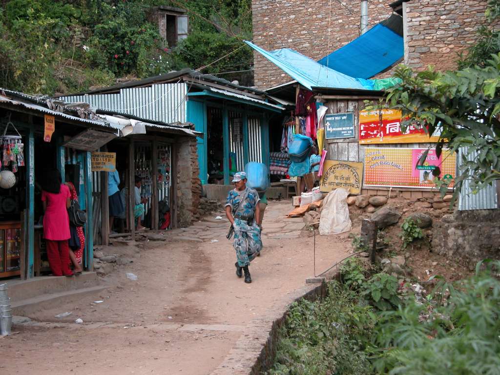 Manaslu 01 07 Arughat Soldiers I was greeted at Arughat by six army soldiers in battle fatigues carrying machine guns, a telltale sign of the Maoist problems in Nepal in 2003.